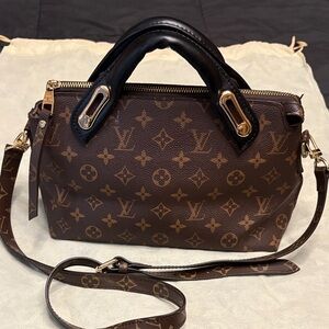 Louis Vuitton Monogram Satchel with Black Handles and removable strap.